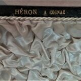 Twelve knife holders with ladle doors.