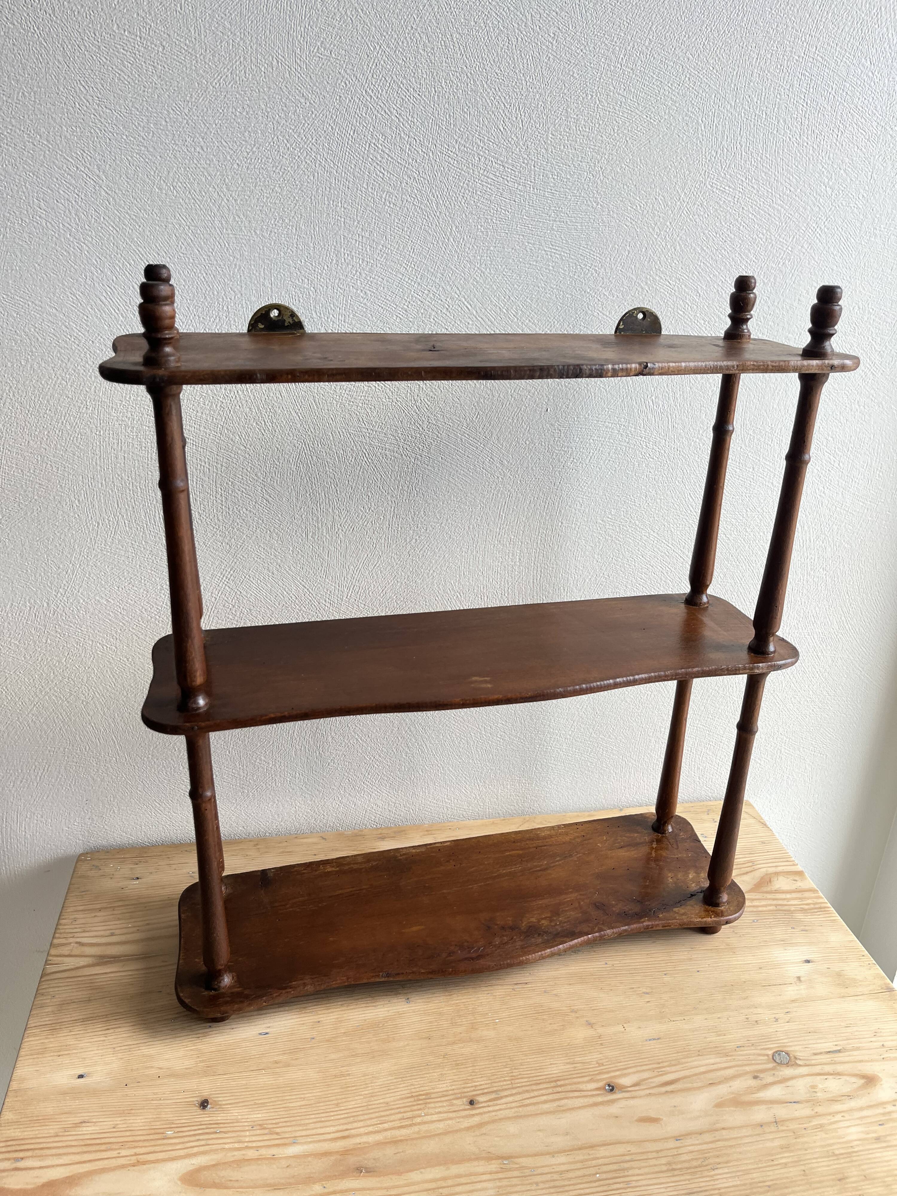 Old wooden reel shelf