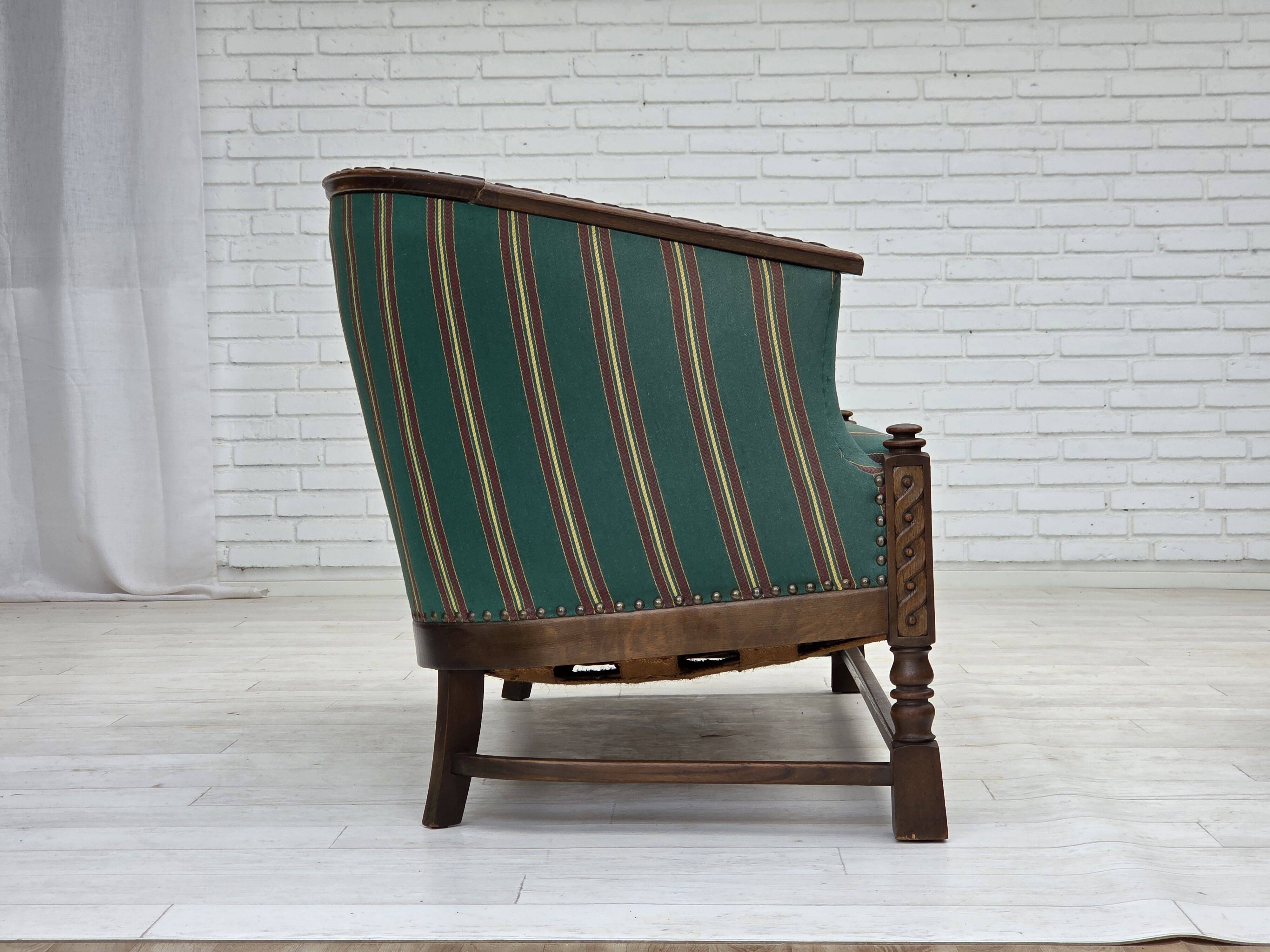1950s, Danish 2-seater sofa, green furniture wool, oak wood.