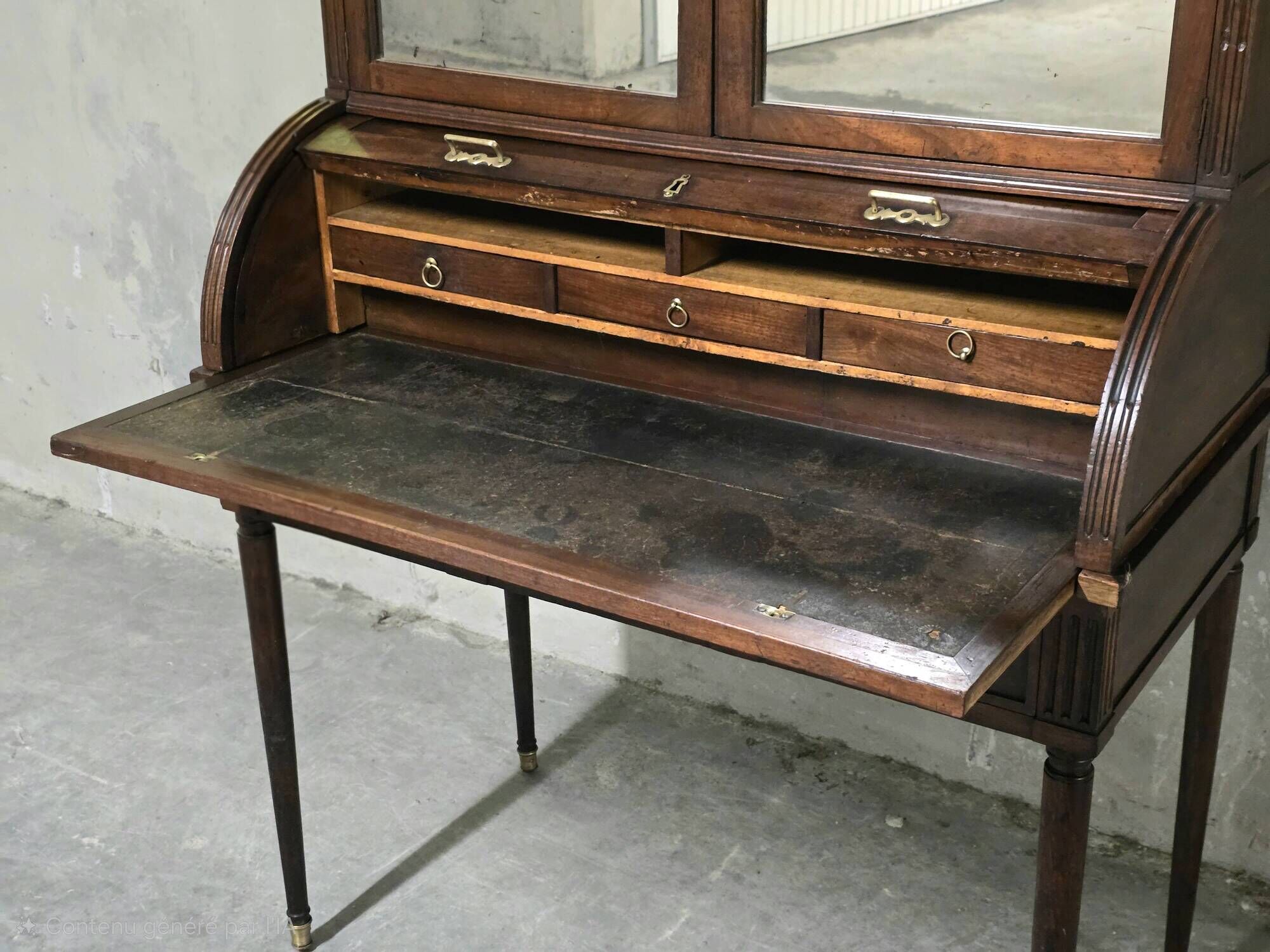 Cylinder desk in mahogany and mahogany veneer, Louis XVI style, 19th century.