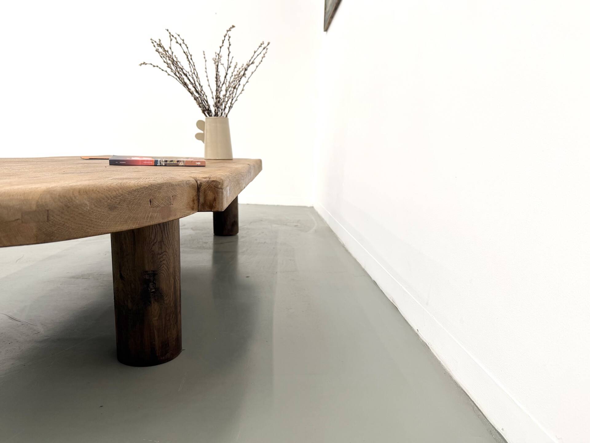 XXL oval coffee table in solid oak, cylindrical base, 1950s.