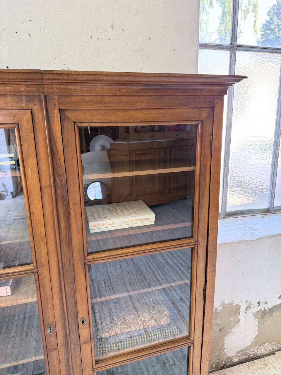 Glass-fronted walnut library 1900