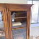 Glass-fronted walnut library 1900