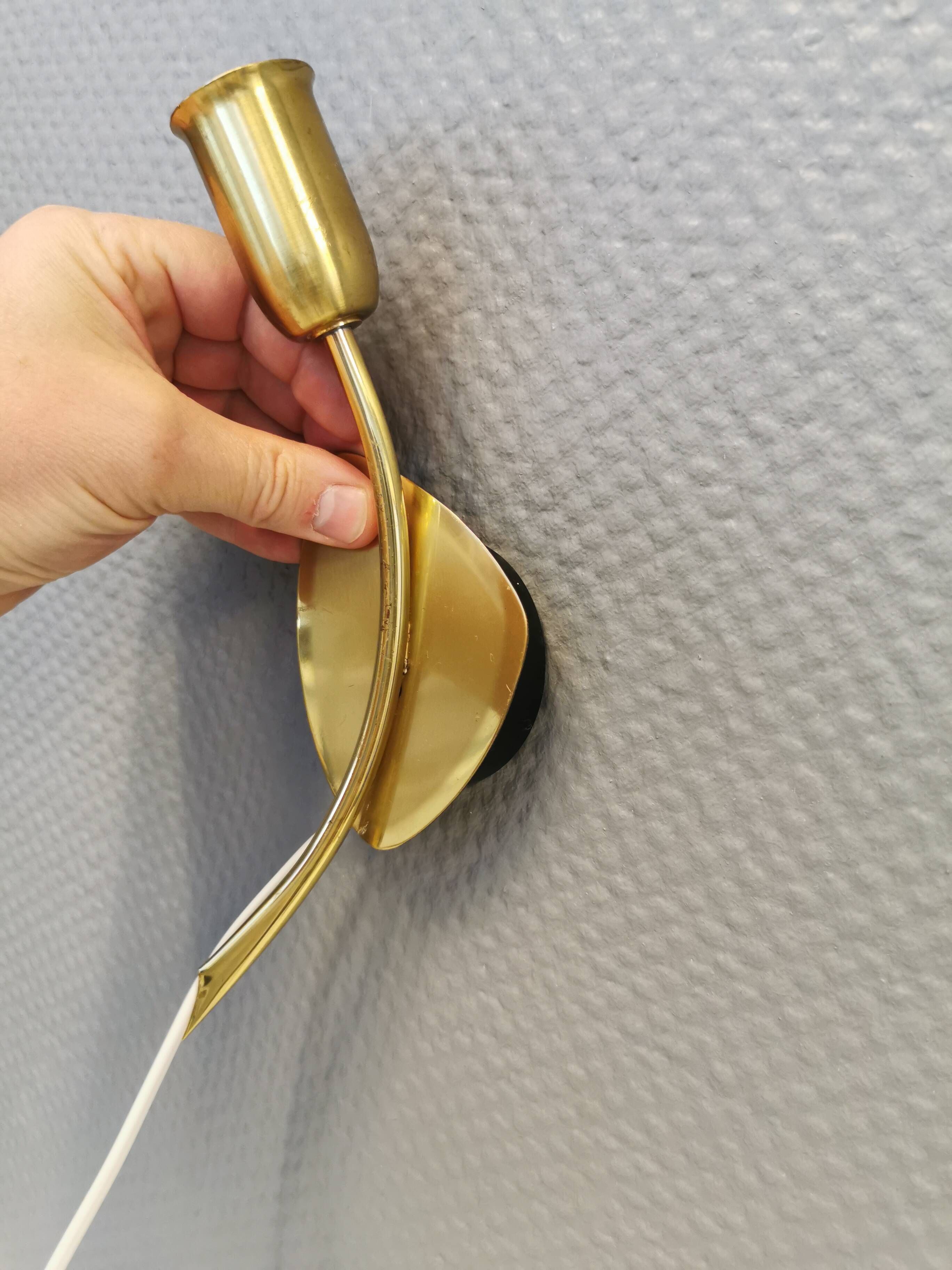 A set of "tulip" wall lamps in golden colored metal. Danish 1970-80s