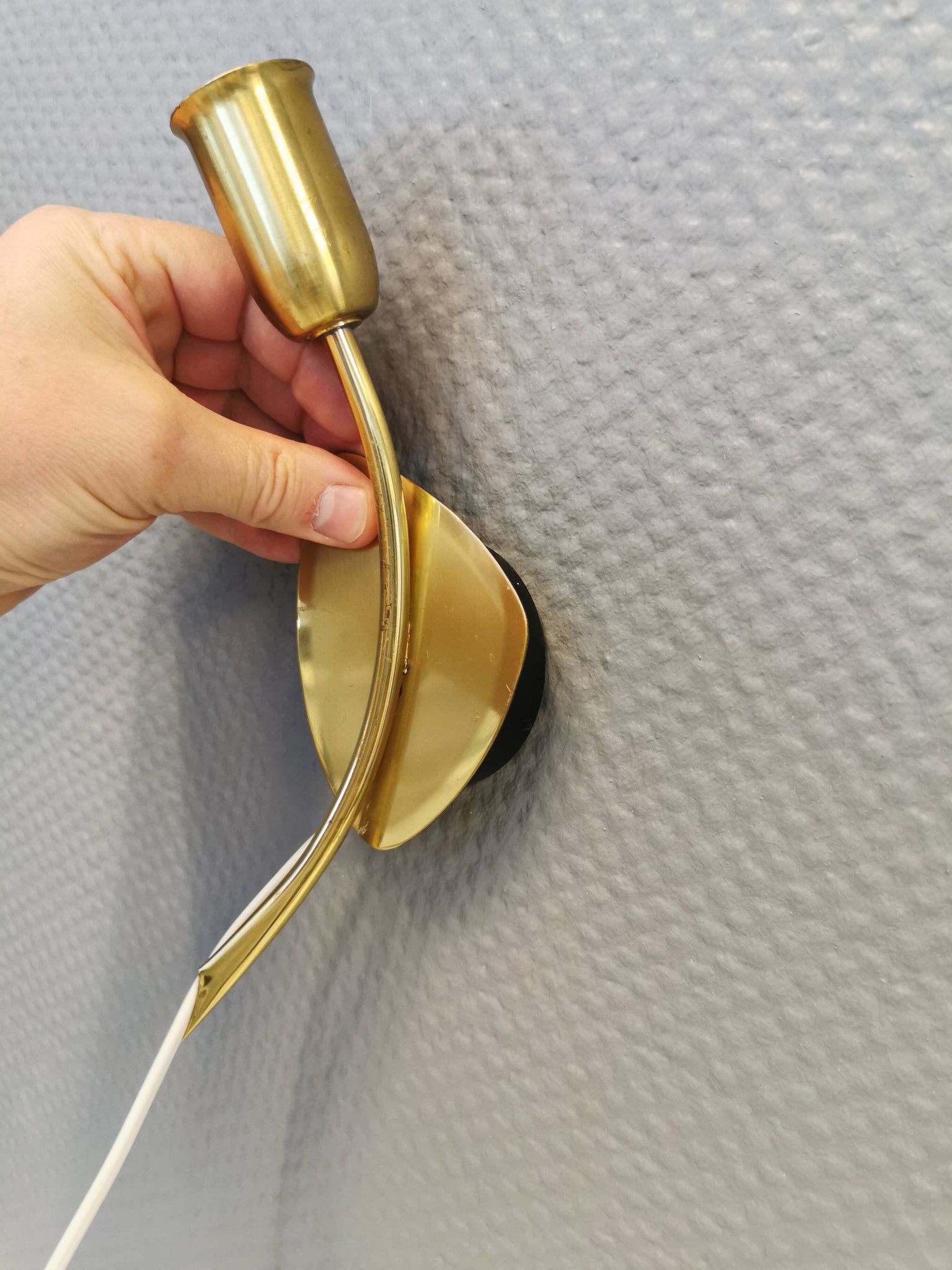 A set of "tulip" wall lamps in golden colored metal. Danish 1970-80s