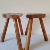 Pair of half-moon tripod stools
