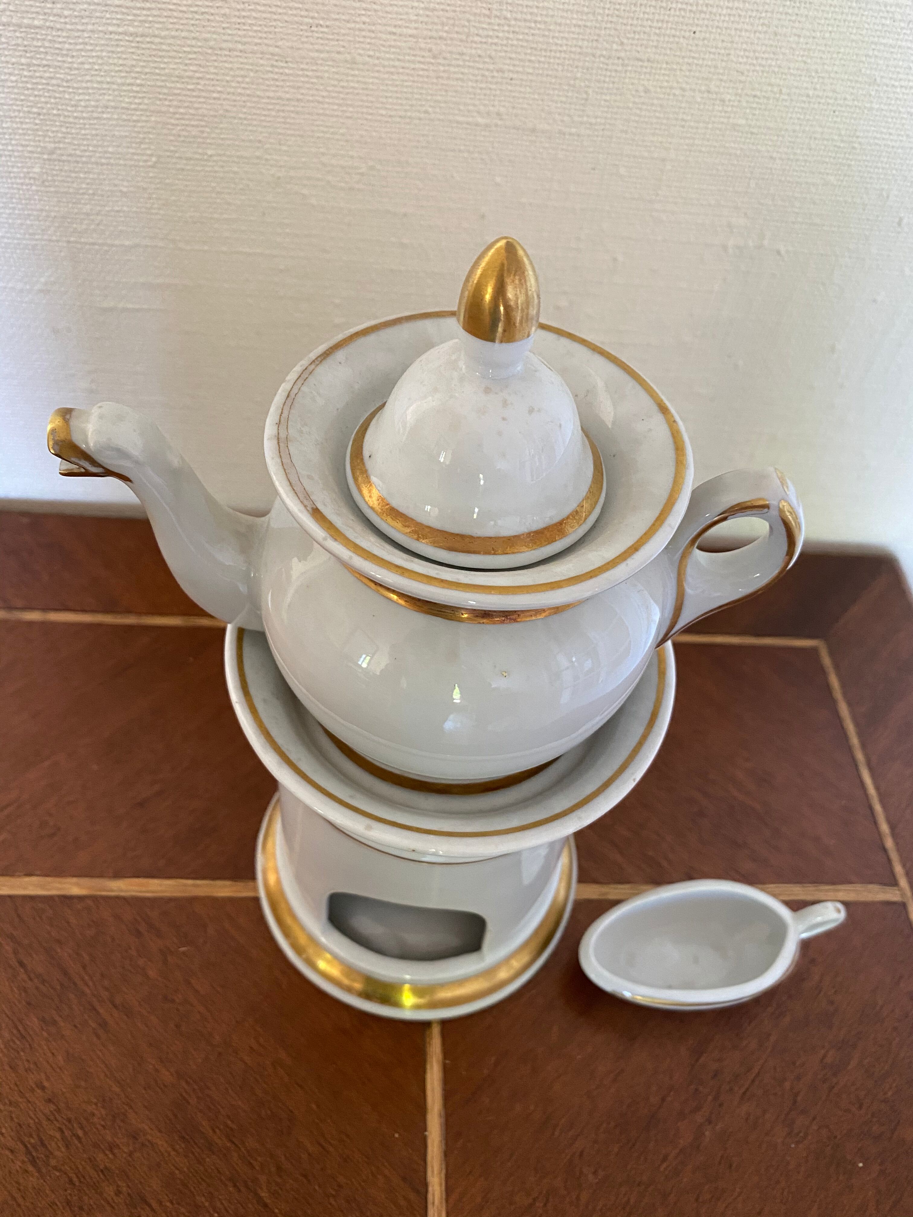 Porcelain teapot with stove