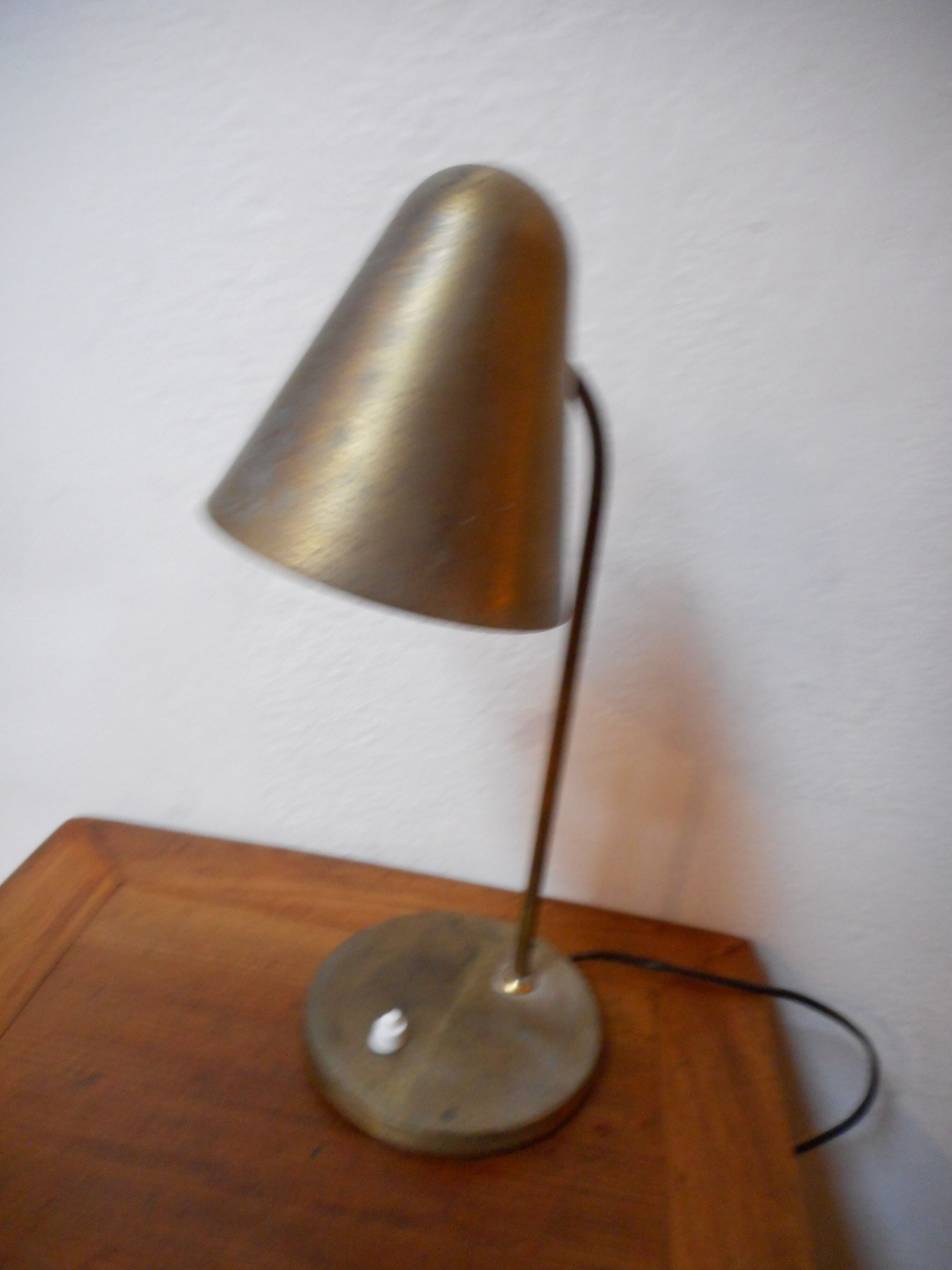 Hinged brass lamp