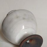 Vase picnic flowers in black sandstone with white enamel