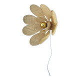 Flower wall light made of rattan and raffia petals