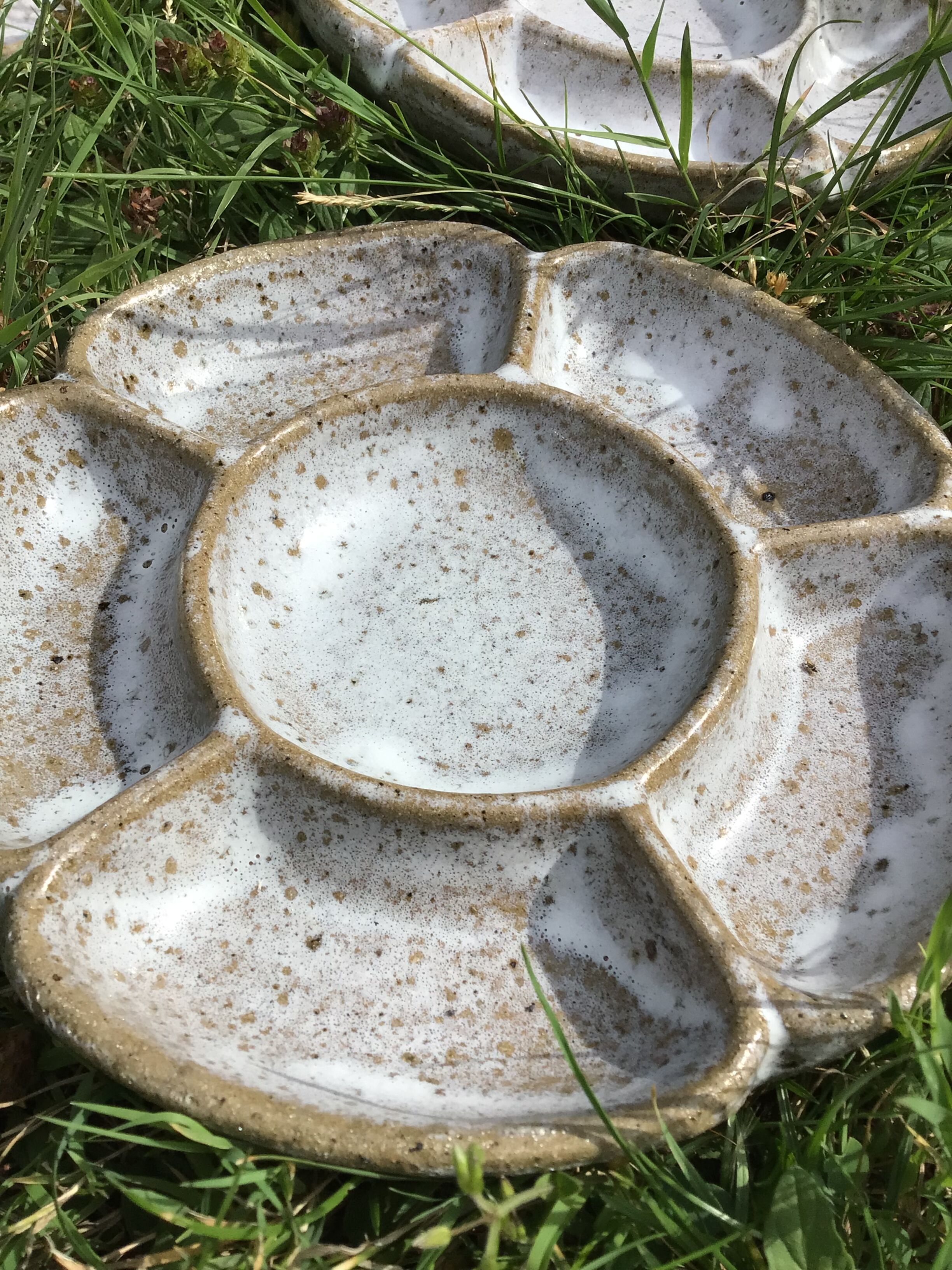4 White compartmentalized handmade stoneware plates