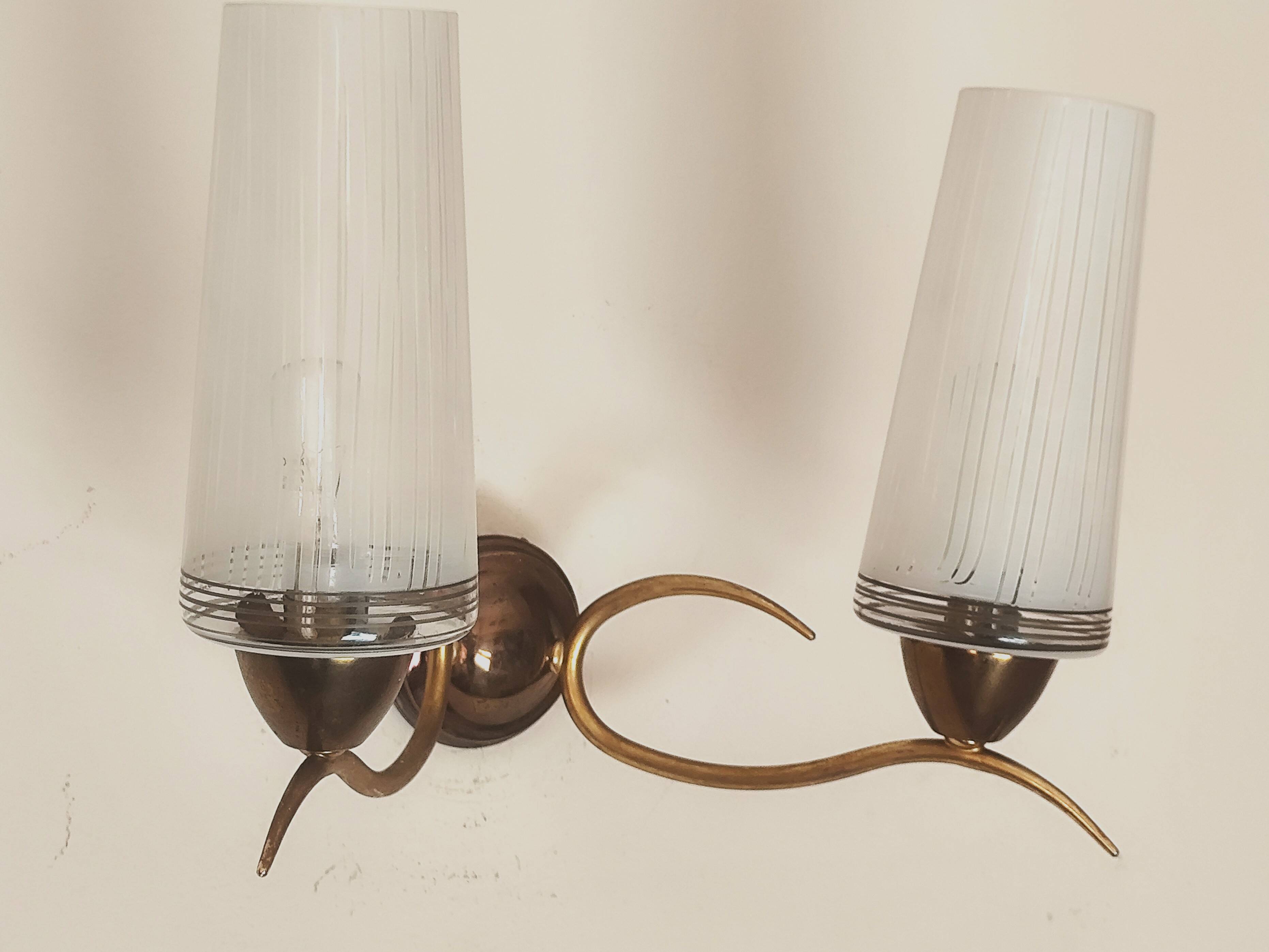Two-light wall sconce in gilded metal with opaque glass shades, 1950/1960
