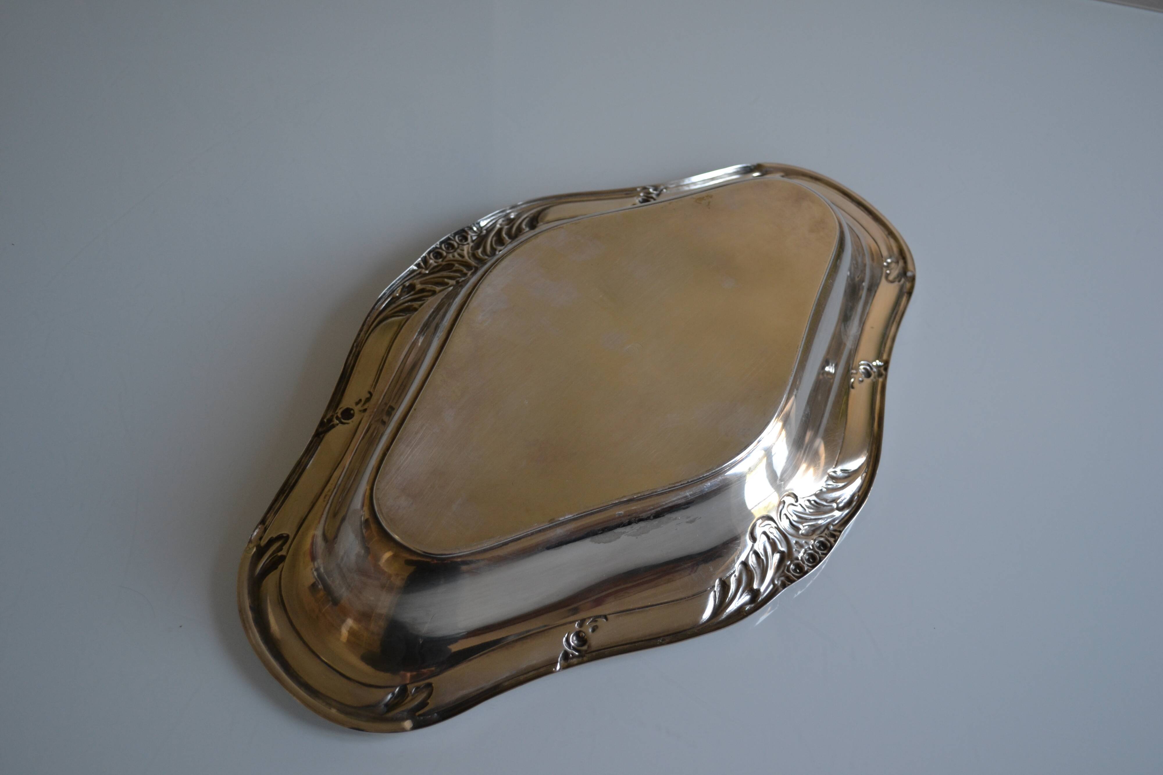 Flat basket cup in silver metal
