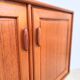 Small teak buffet with 2 doors, vintage Scandinavian style.
