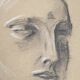 Signed drawing, charcoal study of a woman's face for workshop plaster.