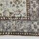 Tapis persan floral vert clair et marron