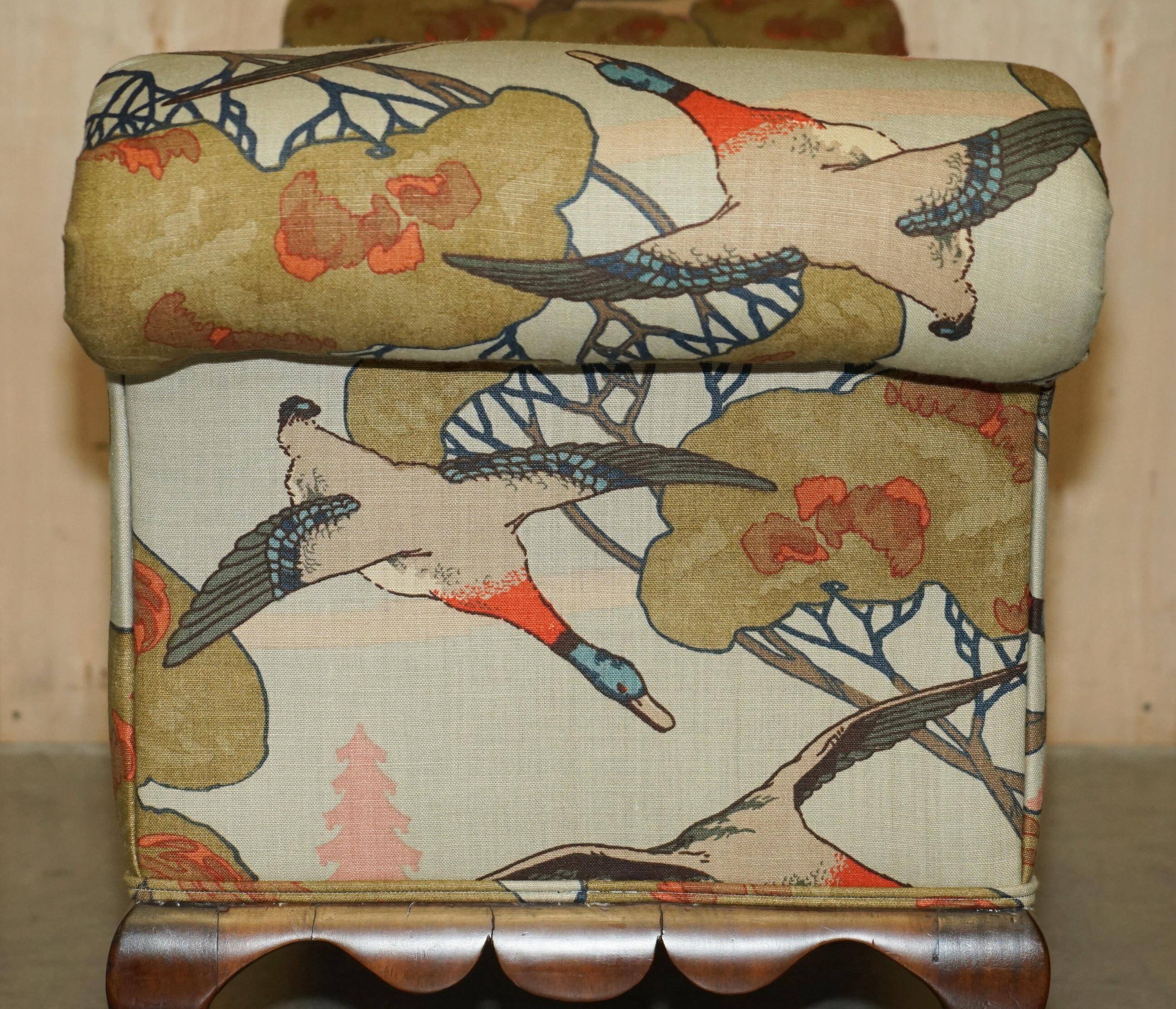 Antique banquette with cluster and ball feet, window seat in Mulberry Flying Ducks fabric.