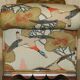 Antique banquette with cluster and ball feet, window seat in Mulberry Flying Ducks fabric.