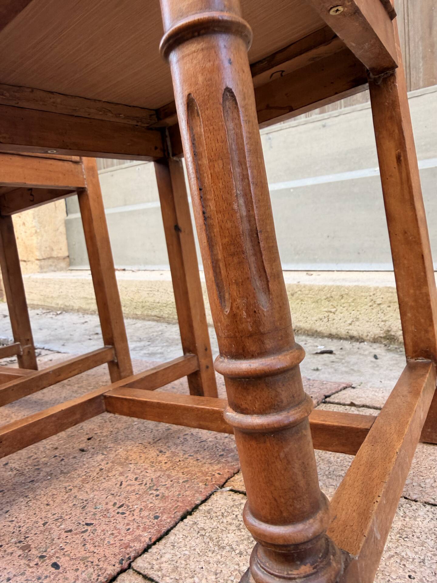 Set of 6 antique turned wooden chairs with embossed leather seats.