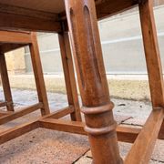 Set of 6 antique turned wooden chairs with embossed leather seats.