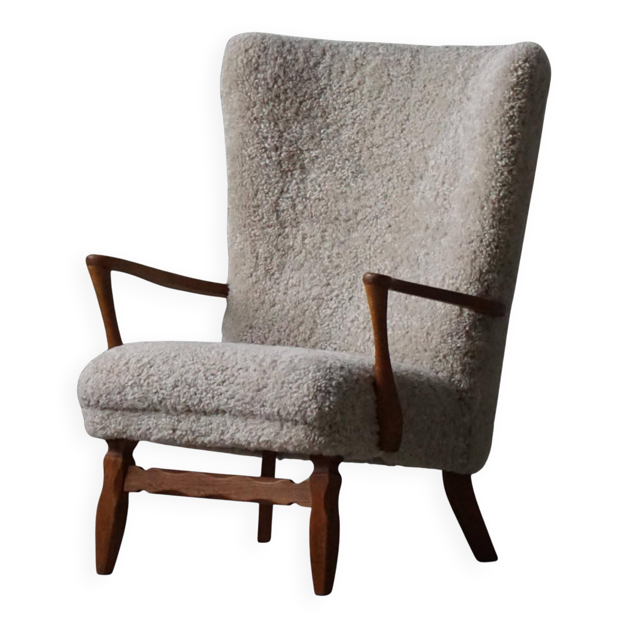 Viggo Boesen, high-back chair in oak and shearling lambskin, modern Danish design, 1950s.