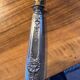Silver cake server with gilded metal, pierced blade, 19th century.