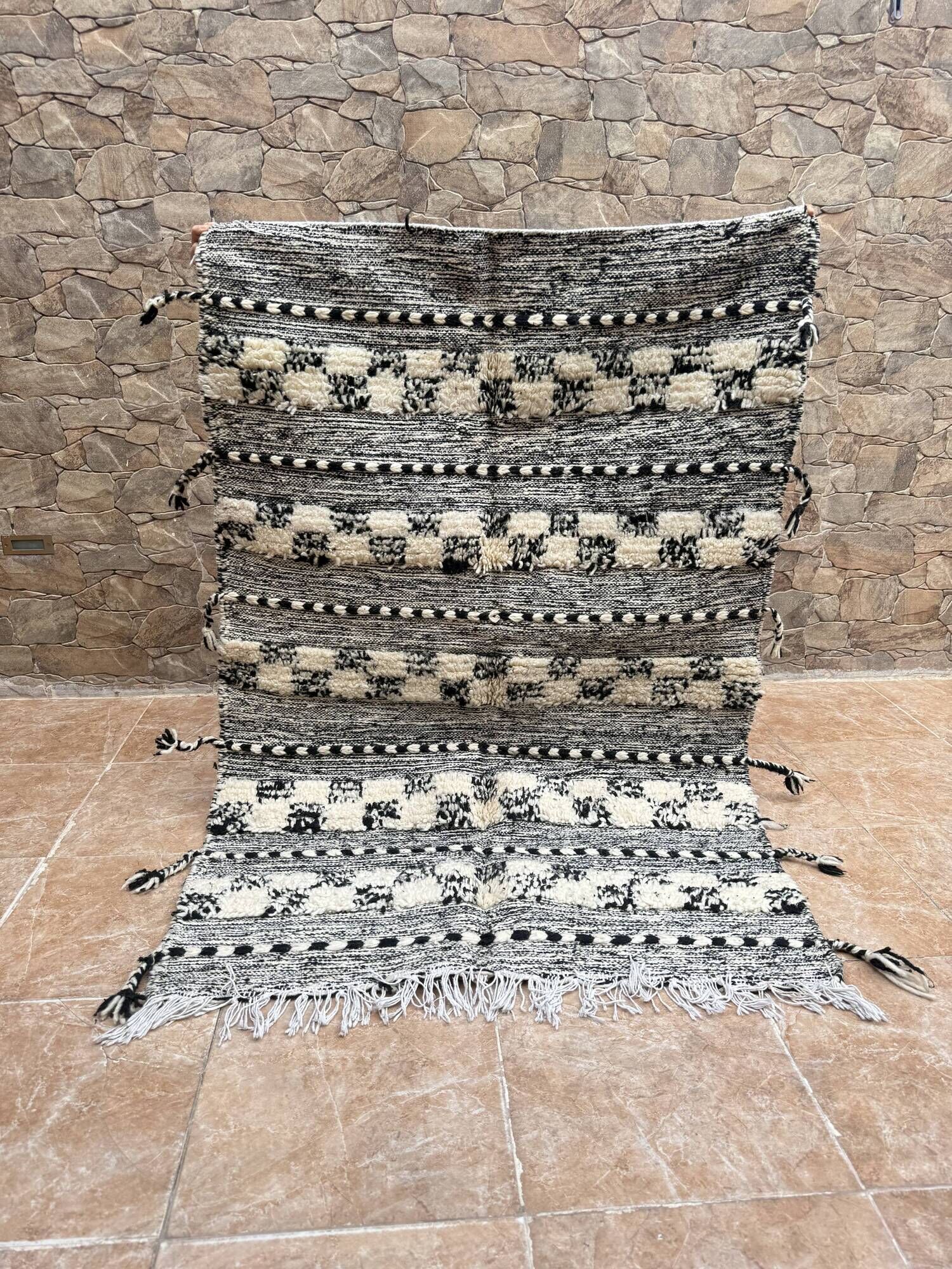 Small black Moroccan Berber Zanafi kilim rug for bedroom and living room.