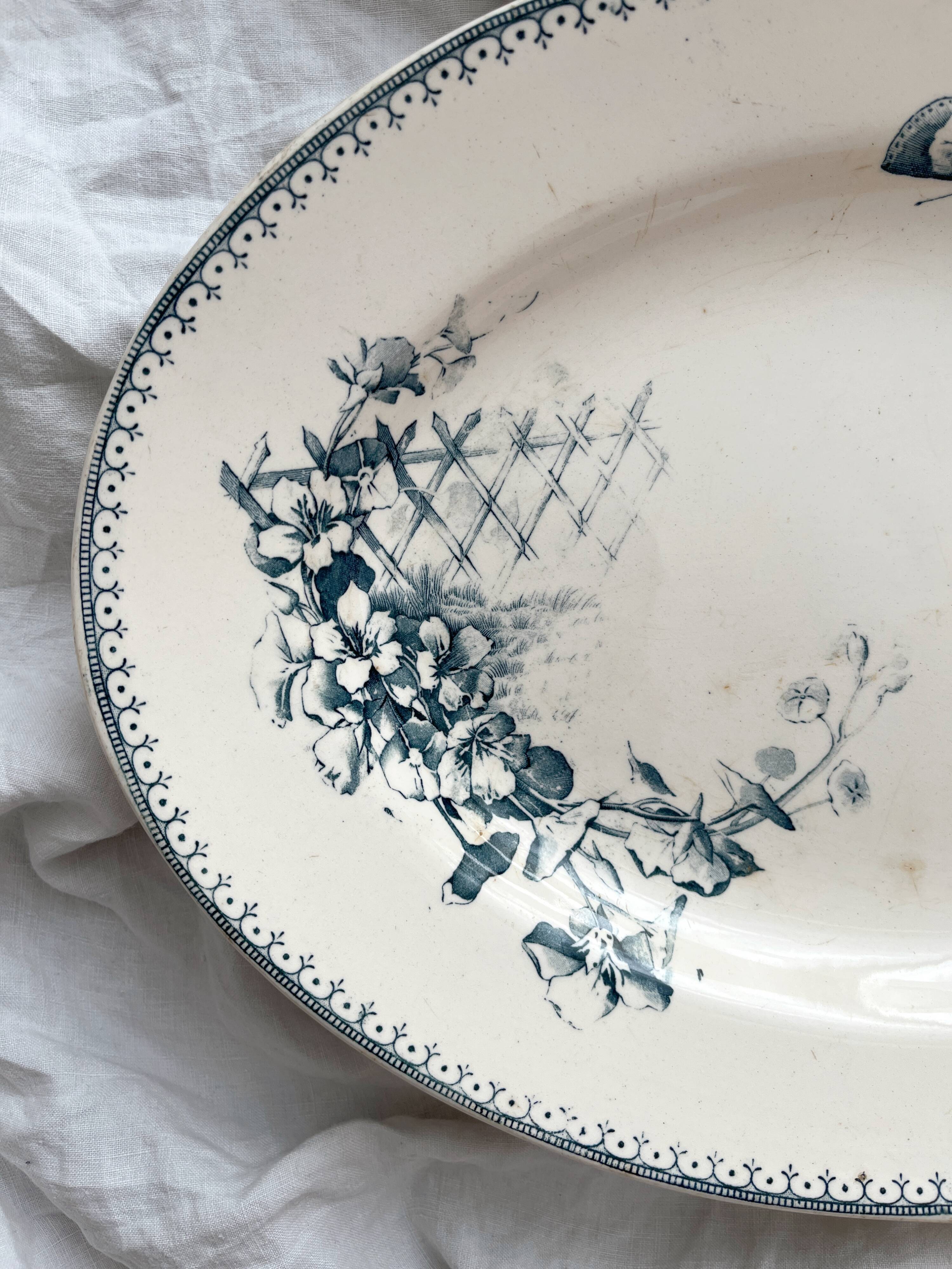 Oval ironstone dish with flowers and birds "Malaga" Petrus Regout