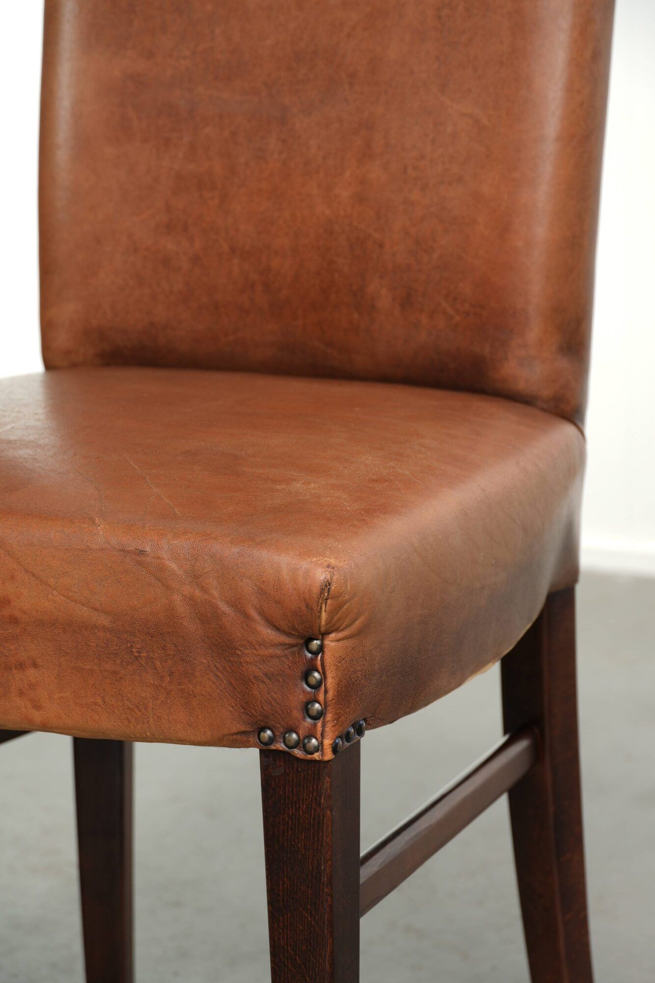 Set of 6 sheepskin dining chairs in a cognac colour with a lovely patina