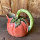 Jug in tomato slipware
