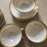 Vintage Limoges porcelain chocolate teacups in pastel yellow and gold