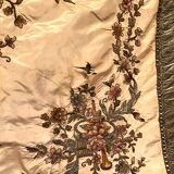 Bedspread converted into silk door with rich decorations embroidered in cinnamon, nineteenth