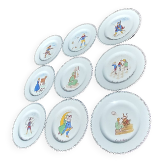 Lot de neuf assiettes plates en porcelaine de Limoges signées "Guérin"