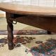 Table basse ovale en sapin début XXème