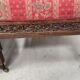 Pair of Gothic-style walnut lounge chairs, 19th century