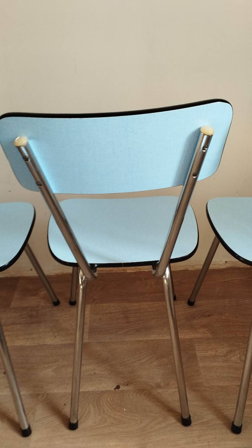 4 blue Formica chairs