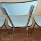 4 blue Formica chairs