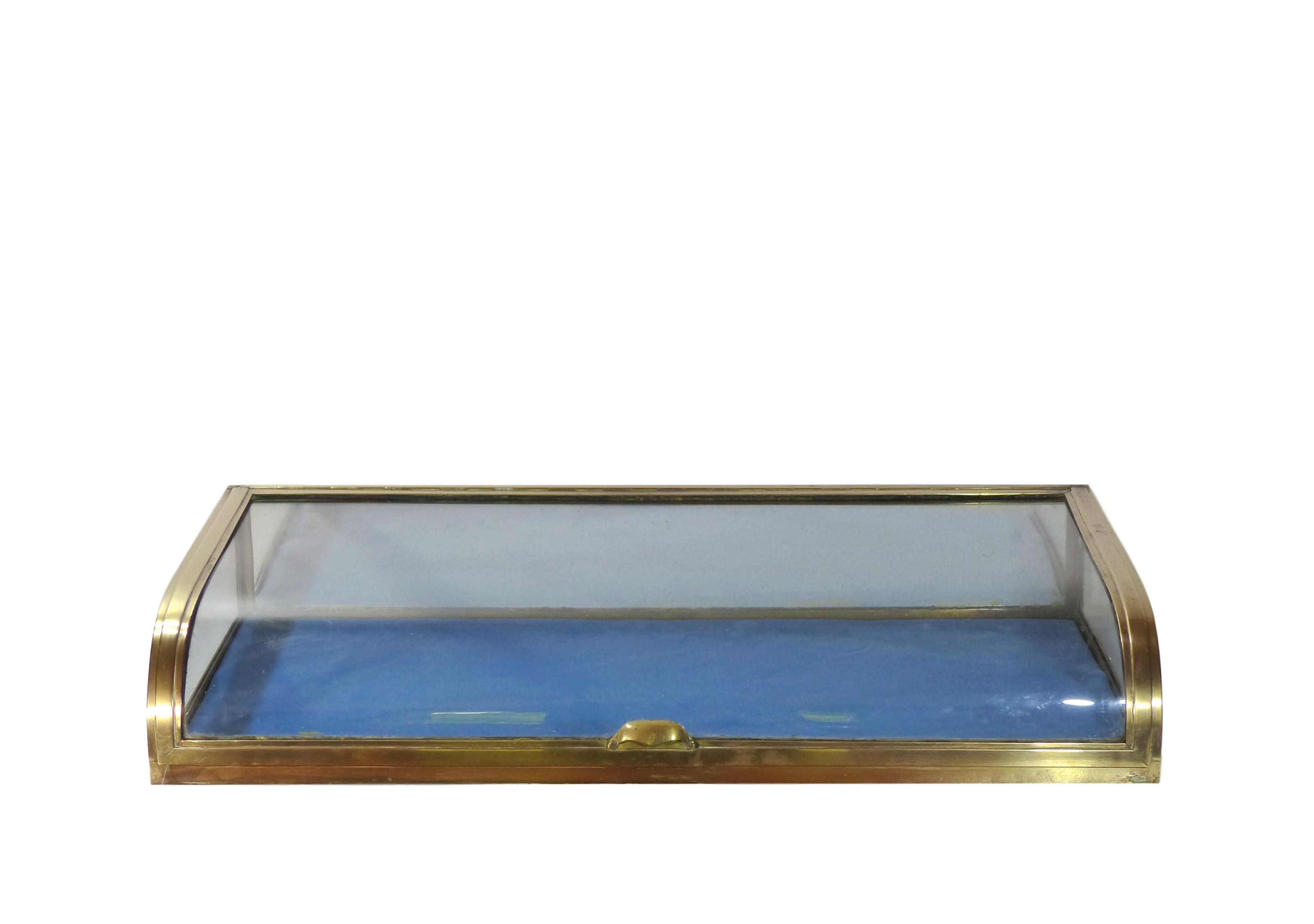 Showcase glass dome and gilded brass