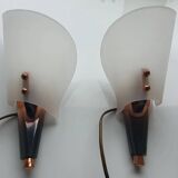 Pair of copper and plexiglass torch wall lights from the 1960s