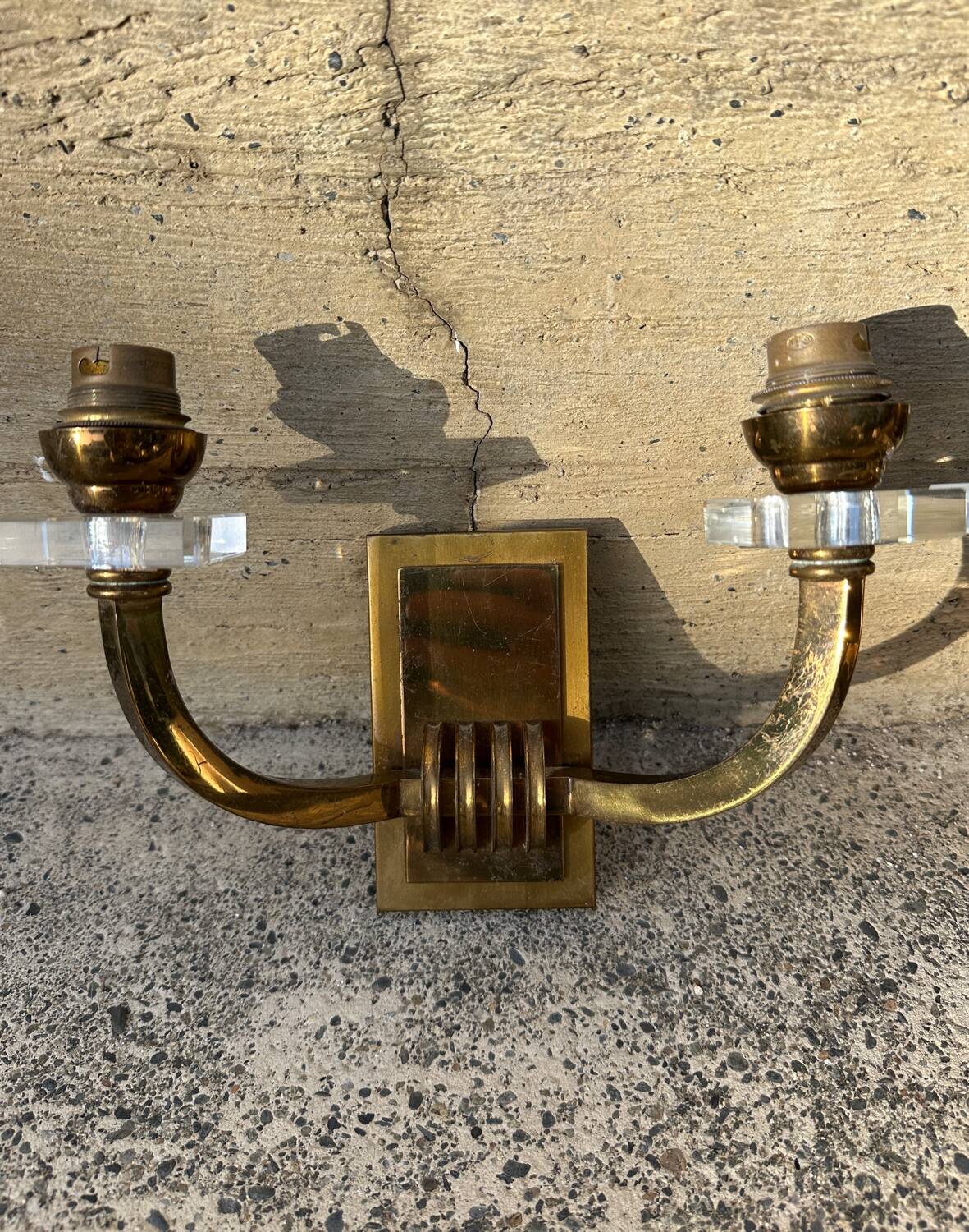 Antique Art Deco wall sconces attributed to Jacques Adnet.