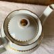 Antique porcelain jug with Limoges enamel