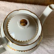 Antique porcelain jug with Limoges enamel
