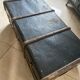Old trunk in zinc/wood and brass