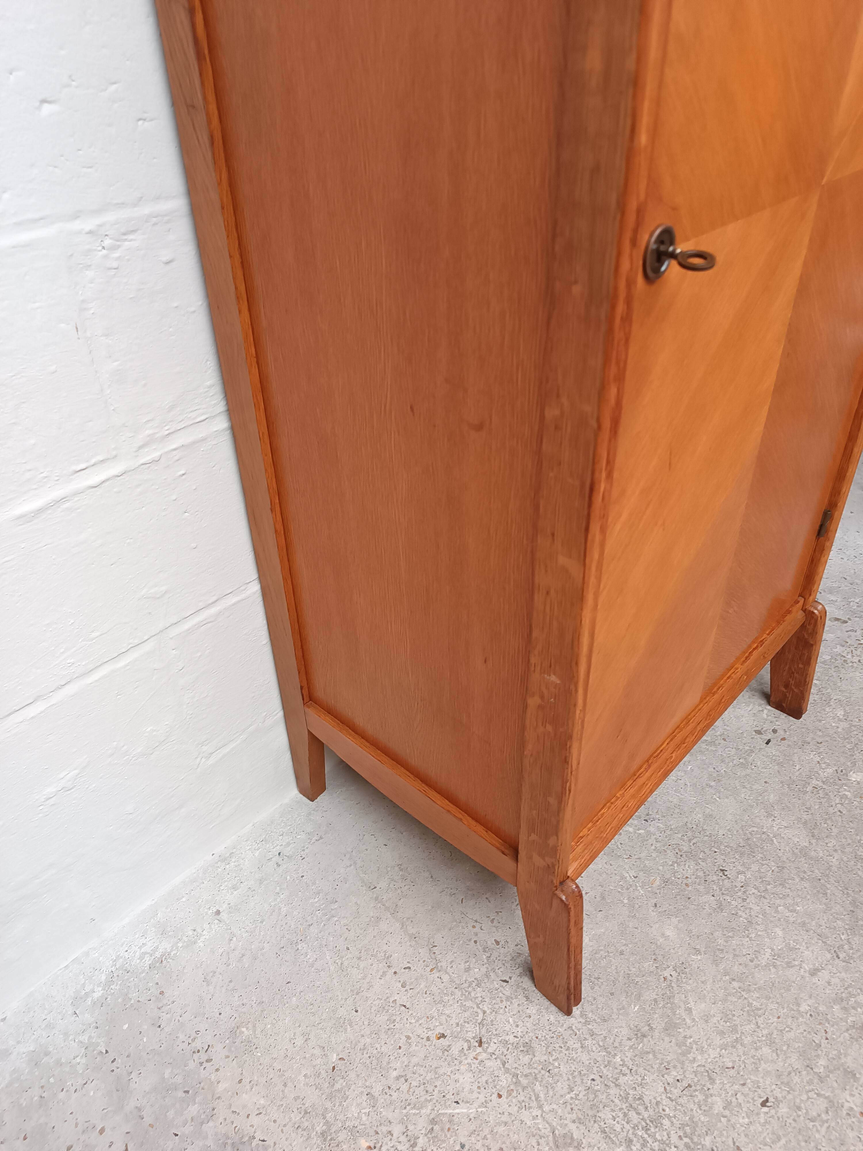 Wing-shaped locker cabinet from the 1950s