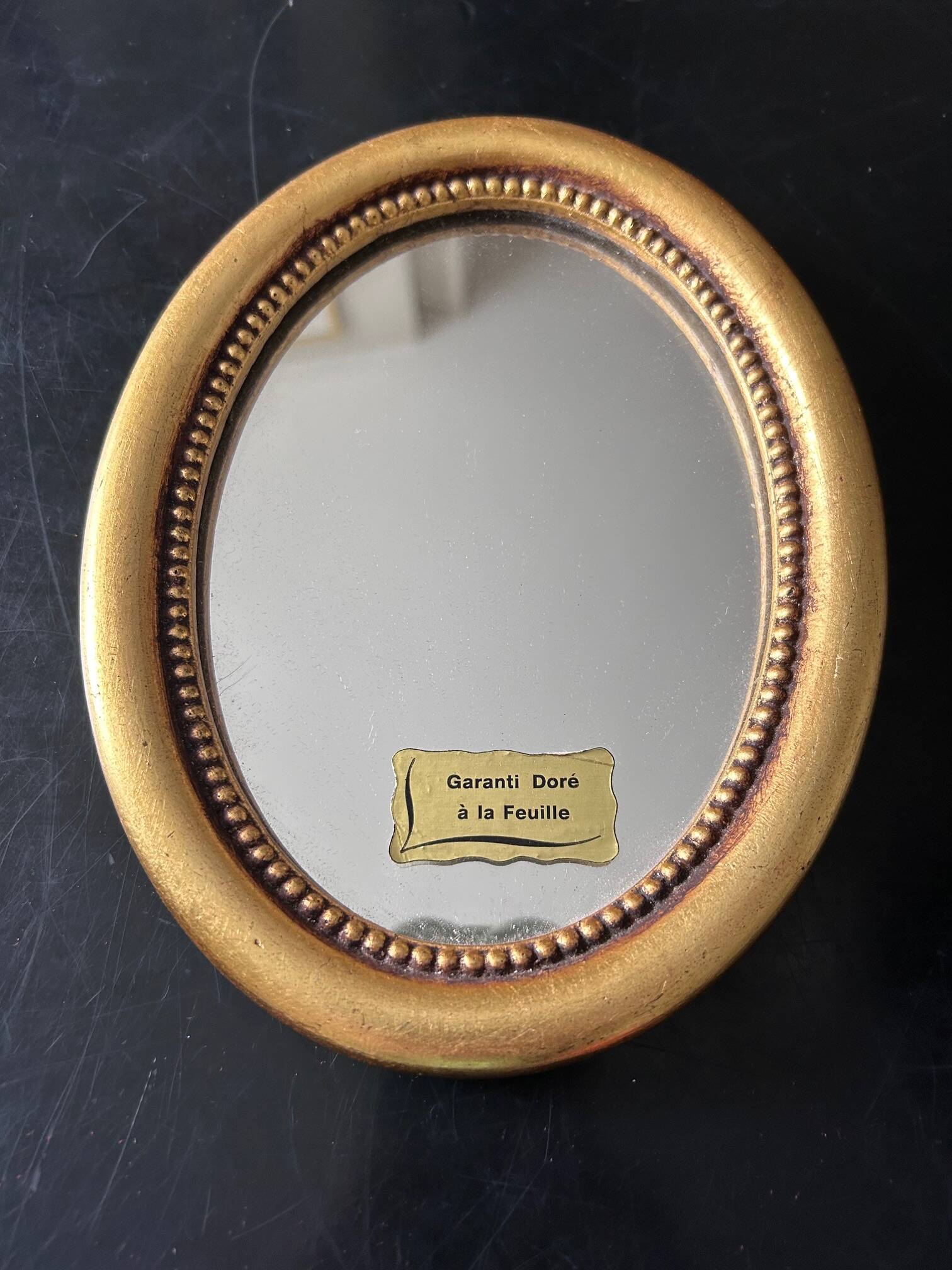 old mirror gilded with fine gold