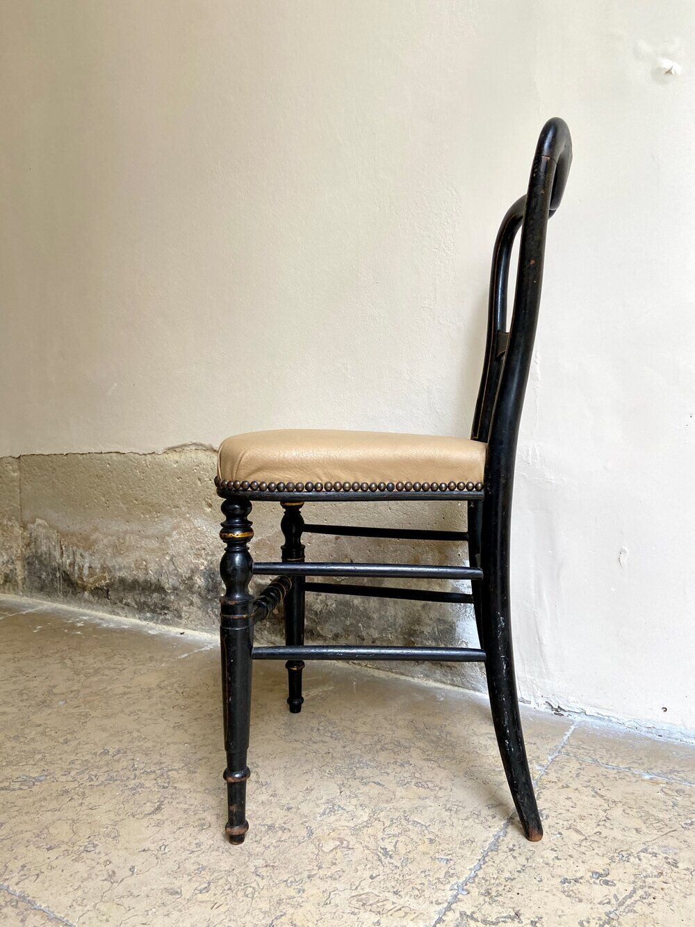 Napoleon III chair in black wood and beige skaï