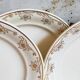 Eight Villeroy & Boch dessert plates with gold decor