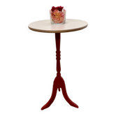 Small taupe and burgundy wooden pedestal table