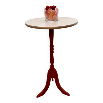 Small taupe and burgundy wooden pedestal table