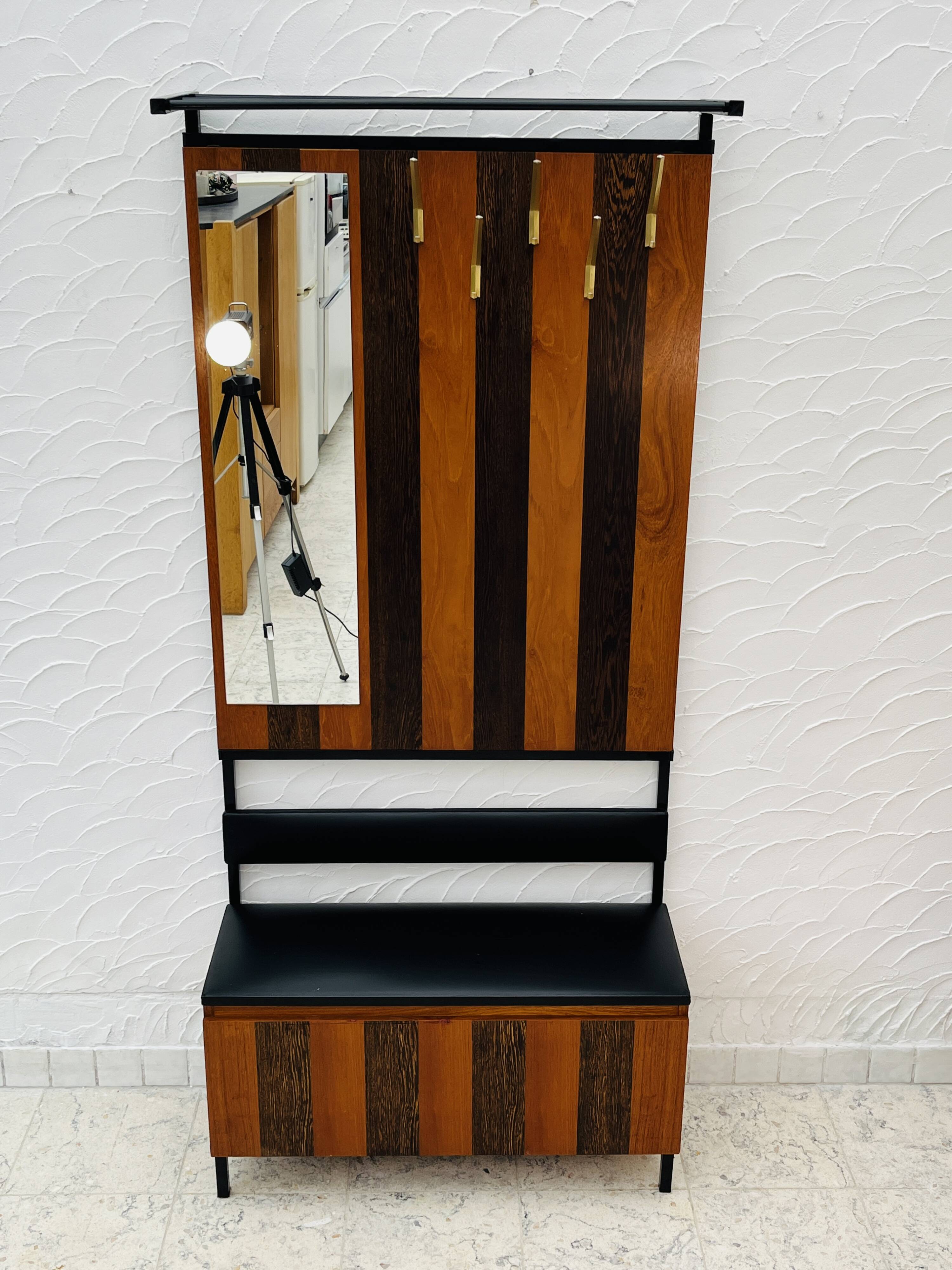 Vintage wall coat rack with storage bench from the 1970s.